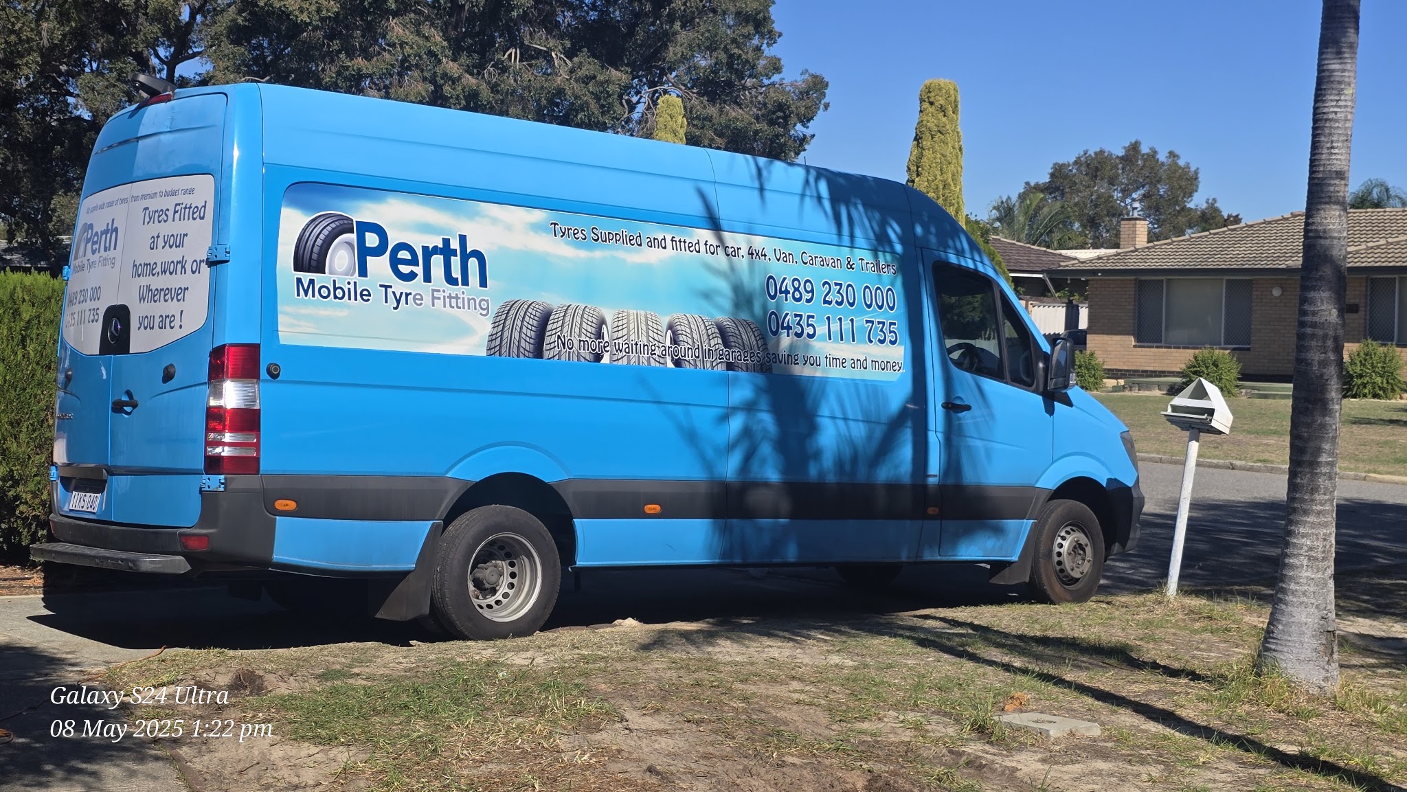 The blue Perth Mobile Tyre Fitting Sprinter van parked outside a customer's home